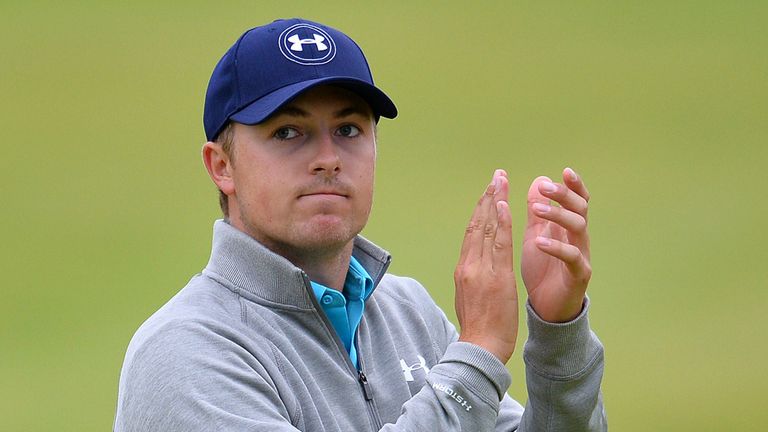 US golfer Jordan Spieth reacts as he leaves the 18th green after his final round 69, on day five of the 2015 British 