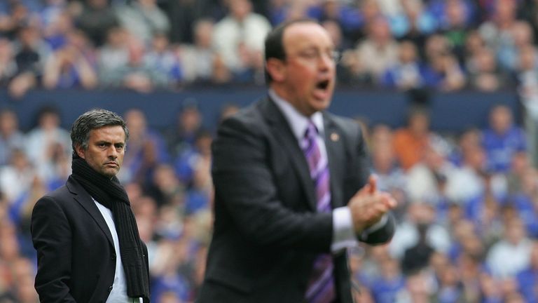 Jose Mourinho of Chelsea and Rafael Benitez of Liverpool watch from the sidelines during the FA Cup semi-final match betwe