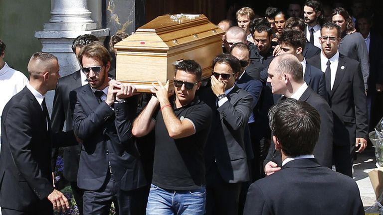Jules Bianchi's coffin is carried from his funeral ceremony in Nice