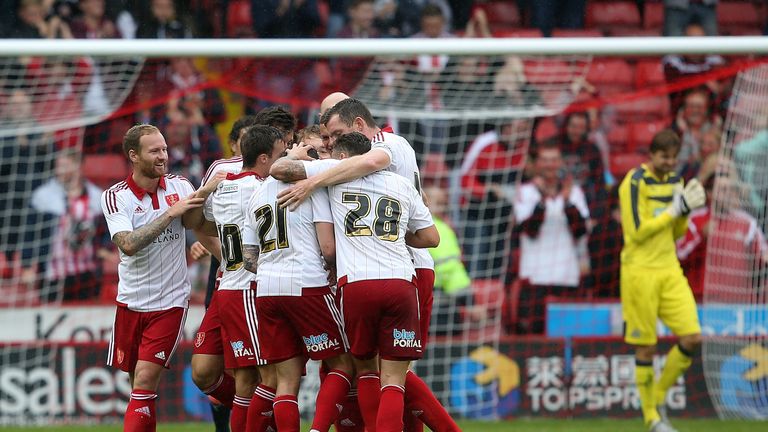 Kieron Freeman of  Sheffield United celebrates his goal with team-mates during the pre-season friendly with Newcastle