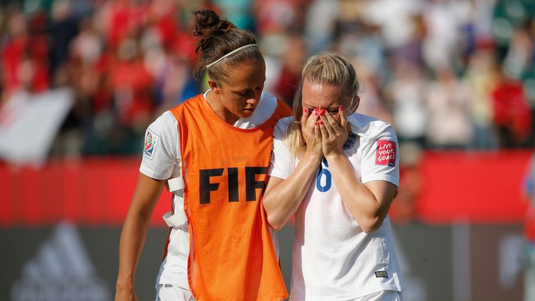 Laura Bassett is comforted by Jo Potter after England's semi-final defeat