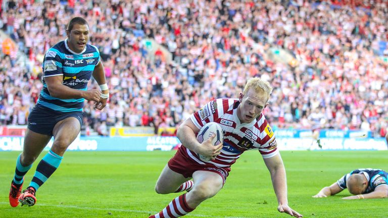 Wigan's Liam Farrell scores his side's opening try against Leeds