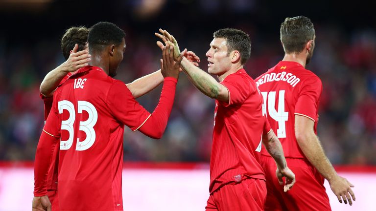 James Milner celebrates with Jordon Ibe after scoring Liverpool's opener