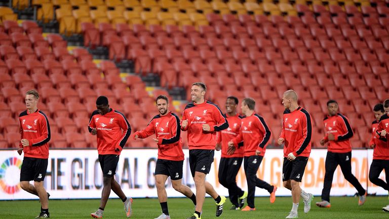 Players warm up during a Liverpool FC training session