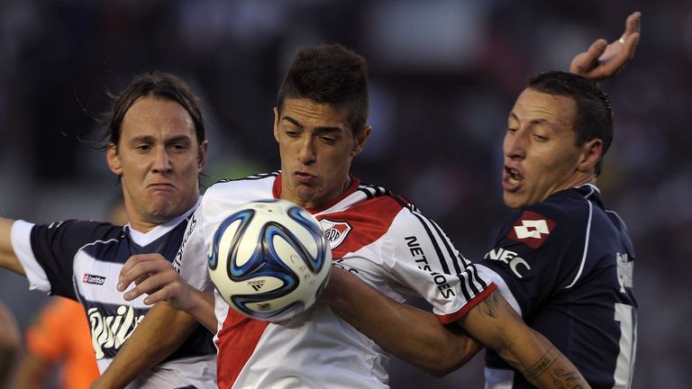 Manuel Lanzini (centre) - on his way to West Ham