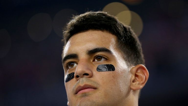 Marcus Mariota #8 of the Oregon Ducks looks on during the national anthem before the College Football Playoff National Championship Game 