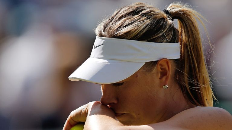 Russia's Maria Sharapova reacts after a point against US player Serena Williams 