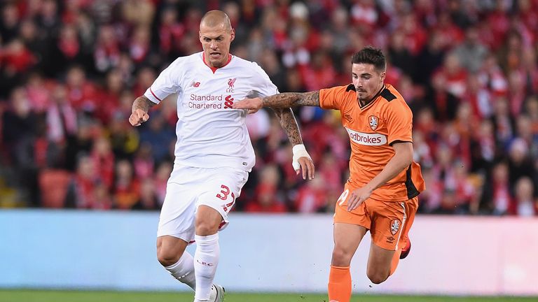 Martin Skrtel of Liverpool FC and Jack Hingert of Brisbane Roar