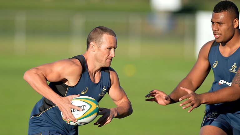 Matt Giteau takes on the defence during an Australian Wallabies training session