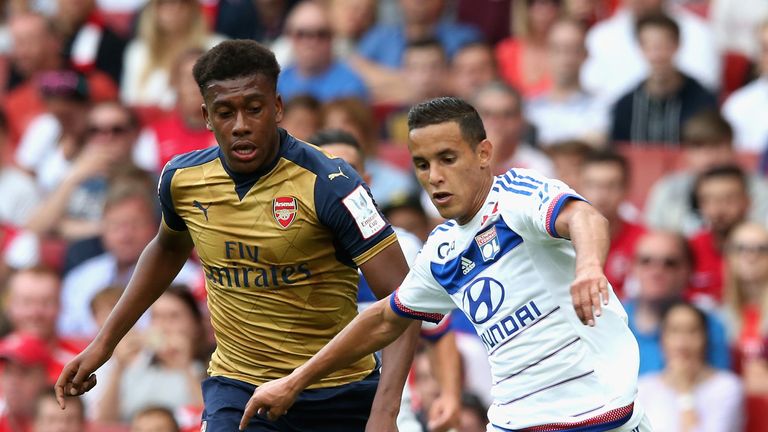 Mehdi Zeffane of Lyon moves away from Alex Iwobi during the Emirates Cup match between Arsenal and Olympique Lyonnais at the Emirates Stadium