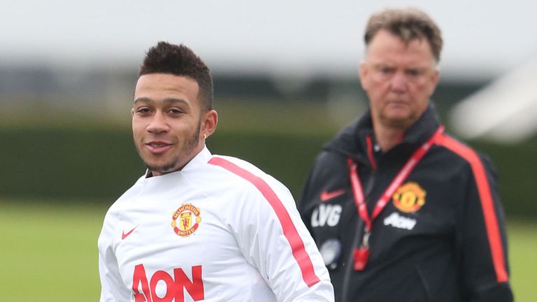 Memphis Depay trains with the Manchester United squad watched by boss Louis van Gaal