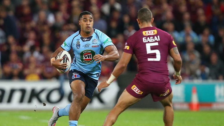 Michael Jennings runs the ball during game three of the State of Origin series between New South Wales and Queensland