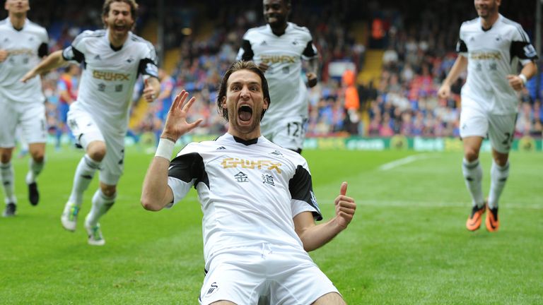 Michu celebrates scoring for Swansea