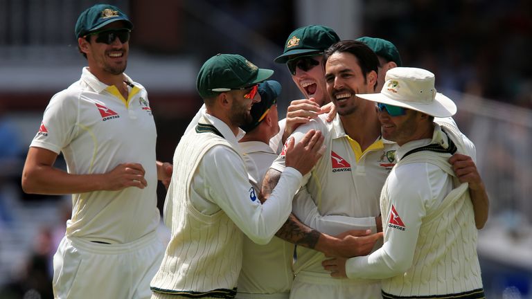 Australia bowler Mitchell Johnson celebrates taking the wicket of England batsman Alastair Cook out for 11 during day four of the Second Ashes Test