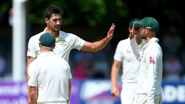 Australia celebrate with Mitchell Starc after he bowls out Ravi Bopara of Essex during day four of the tour match between Essex and Australia