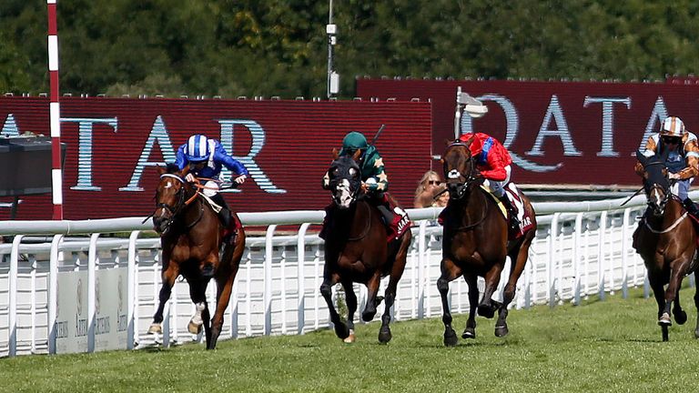 Paul Hanagan riding Muthmir (left) to win the Qatar King George Stakes at Goodwood 