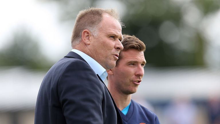 Blackpool's manager Neil McDonald and his assistant Richie Kyle during the game against Lancaster