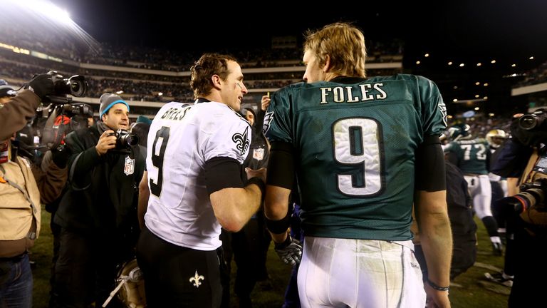 PHILADELPHIA, PA - JANUARY 04:  (L-R) Drew Brees #9 of the New Orleans Saints talks with Nick Foles #9 of the Philadelphia Eagles after their NFC Wild Card