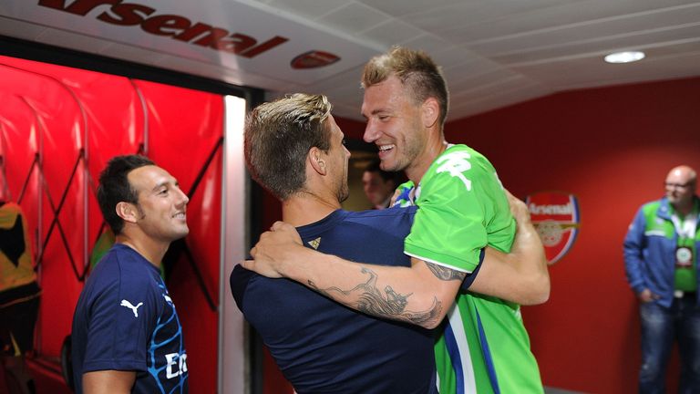 Wolfsburg's Nicklas Bendtner with Arsenal's Santi Cazorla and Nacho Monreal at the Emirates Cup on July 25, 2015 in London, England