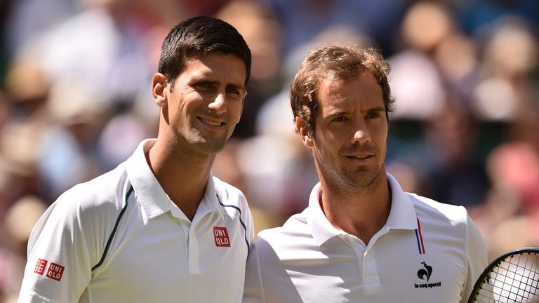 Serbia's Novak Djokovic stands with France's Richard Gasquet ahead of their men's semi-final match on day eleven of the 2015 Wimbledon Championships