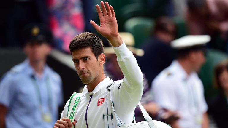Novak Djokovic acknowledges the crowd following his victory over Marin Cilic 