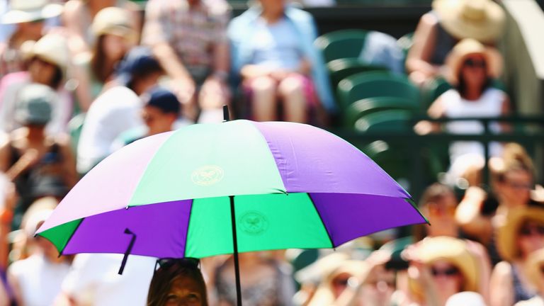 Novak Djokovic takes a drink