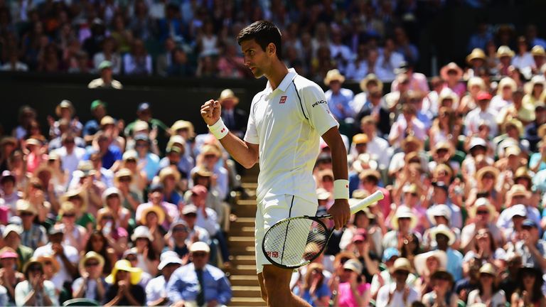 Novak Djokovic of Serbia celebrates winning a point against Richard Gasquet