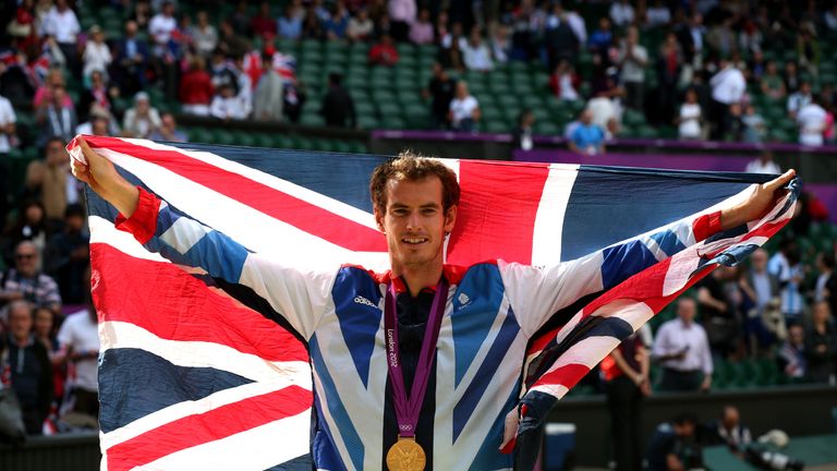 Gold medalist Andy Murray of Great Britain celebrates during the medal ceremony for the Men's Singles Tennis match on Day 9 at the Olympics