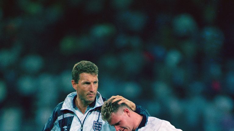 A tearful Gascoigne is consoled by England team-mate Terry Butcher