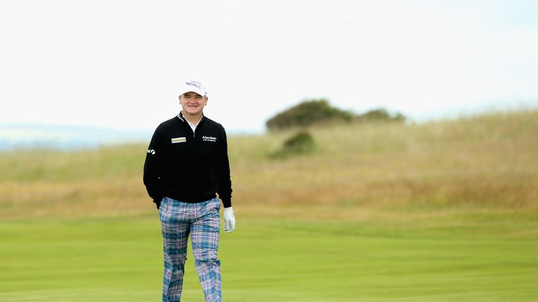 Paul Lawrie of Scotland smiles on the ninth hole during the Pro-Am prior to the start of the Aberdeen Asset Management Scotti