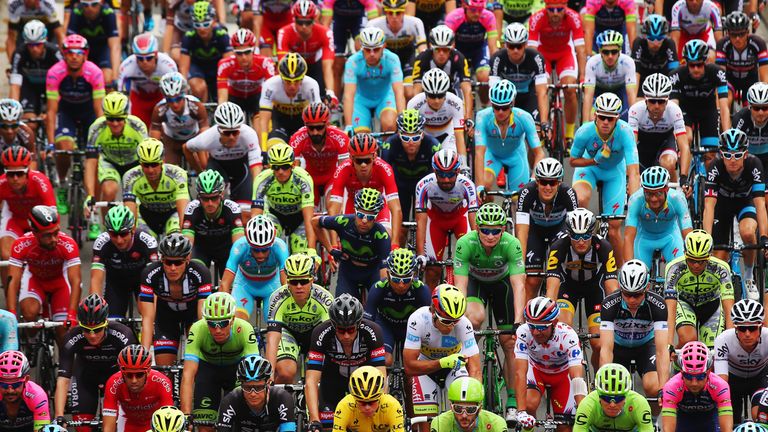 SERAING, BELGIUM - JULY 07:  The peloton rides at the start of stage four of the 2015 Tour de France, a 223.5km stage between Seraing and Cambrai, on July 