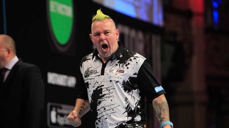 BETVICTOR WORLD MATCHPLAY 2015.WINTER GARDENS,BLACKPOOL.PIC;LAWRENCE LUSTIG.ROUND 2.PETER WRIGHT V ANDREW GILDING.PETER WRIGHT IN ACTION