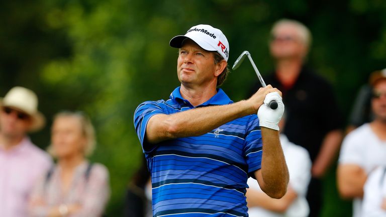 Retief Goosen of South Africa tees off during the BMW International Open day four at the Eichenried Golf Club.