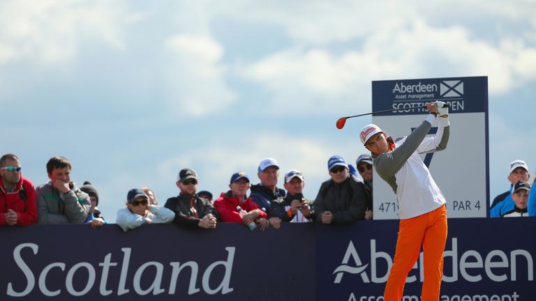 GULLANE, SCOTLAND - JULY 12:  Rickie Fowler of the United States hits his tee shot on the seventh hole during the final round of the Aberdeen Asset Managem