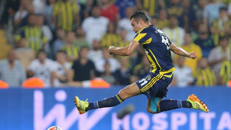 : Robin van Persie of Fenerbahce kicks the ball for goal during UEFA Champions League Third Qualifying Round 1st Leg match betwe