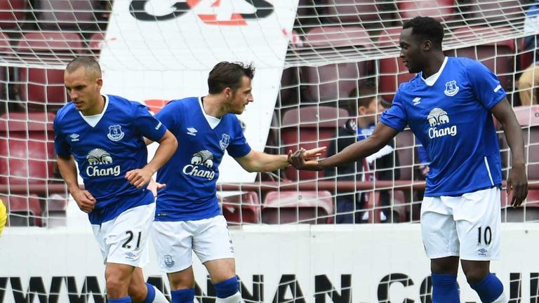 Leon Osman and Leighton Baines congratulate Romelu Lukaku after he completes his hat-trick against Hearts.