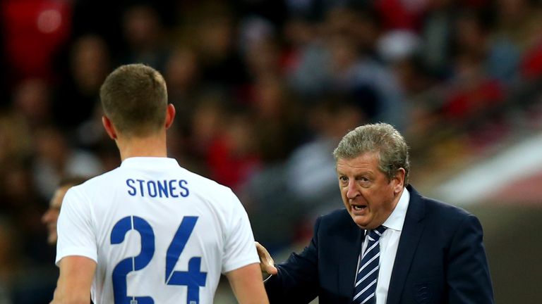 LONDON, ENGLAND - MAY 30:  Roy Hodgson, Manager of England speaks to John Stones of England during the international friendly match v Peru