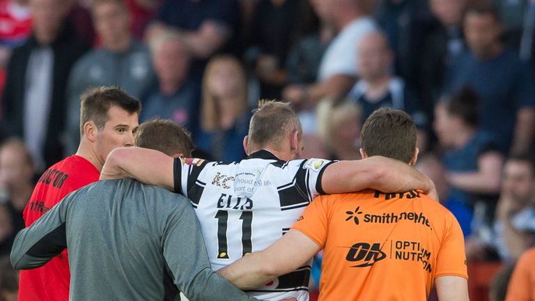 Hull FC captain Gareth Ellis is helped off after suffering an Achilles injury against Hull KR