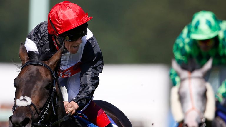 Frankie Dettori celebrates after riding Golden Horn to victory in the Coral-Eclipse at Sandown