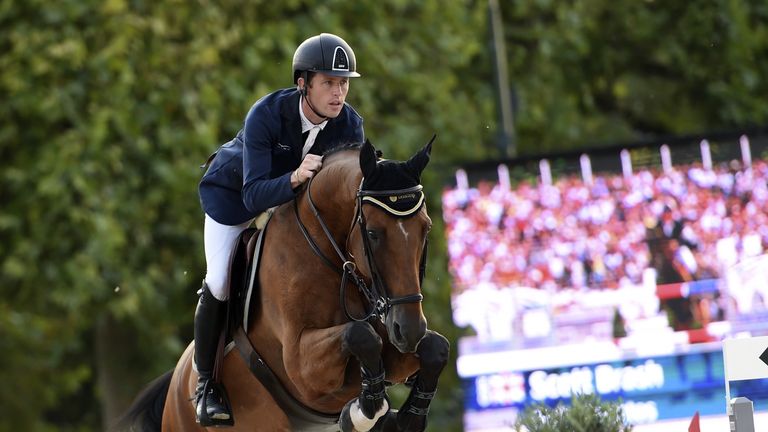 Britain's Scott Brash, riding Hello Sanctos, competes during the Longines Global Champions Tour Grand Prix 