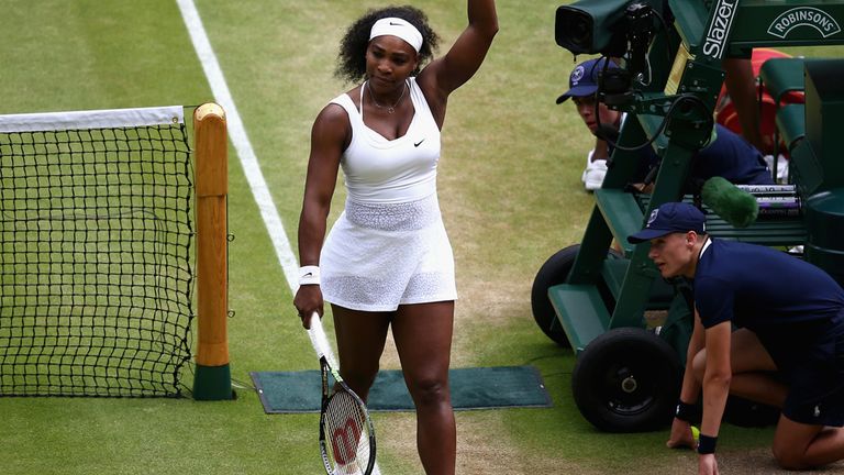 Serena Williams celebrates after beating sister Venus to reach the last eight at Wimbledon