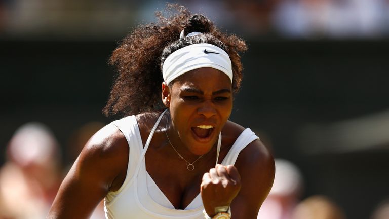 Serena Williams of the United States celebrates winning a point in the Final Of The Ladies' Singles against Garbine Muguruza of
