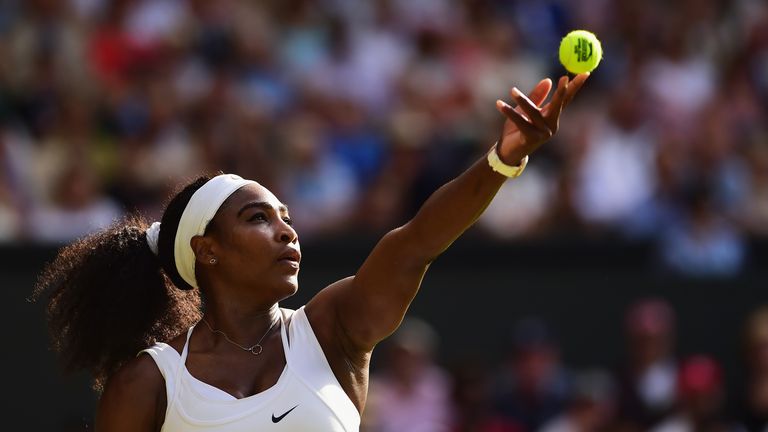 Serena Williams of the United States serves in her Ladies’ Singles Third Round match against Heather Watson of Great Britain d
