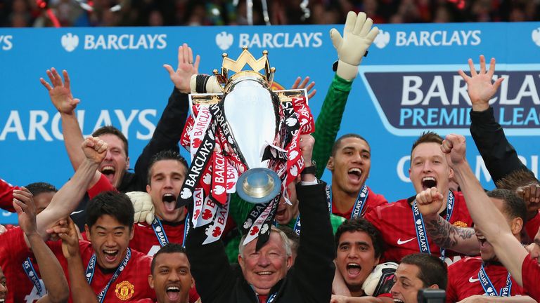 Sir Alex Ferguson lifts the Premier League trophy for the 13th and final time at Old Trafford