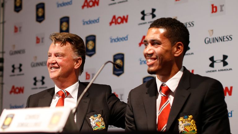  Louis van Gaal and Chris Smalling have a giggle in California