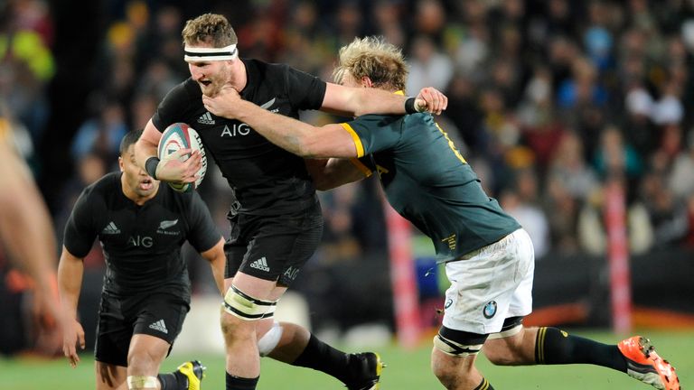 Kieran Read of New Zealand tackled by Schalk Burger (Boks captain) during The Castle Lager Rugby Championship 2015 match.