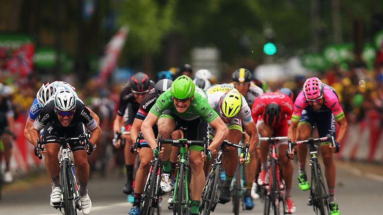 AMIENS, FRANCE - JULY 08:  Mark Cavendish (L) of Great Britain and Etixx-Quick Step and Andre Greipel (C) of Germany and Lotto-Soudal lead the sprint for t