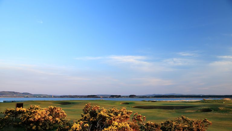 The greens on the par 3, 11th hole (left) and par 4, 7th hole on the Old Course at St Andrews venue for the 2015 Open Cha