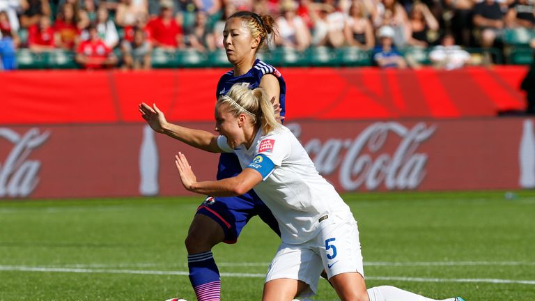 Japan's Yuki Ogimi (left) trips England defender Steph Houghton and concedes a penalty in the Women's World Cup semi-finals