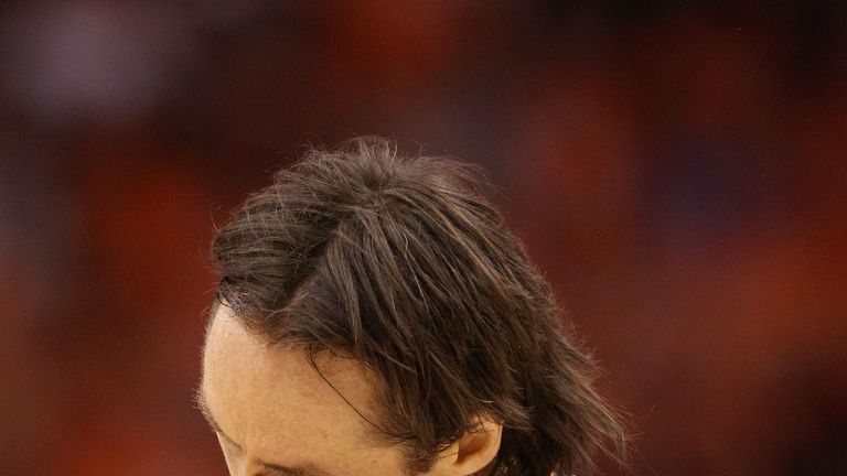 Steve Nash reacts after being hit in the nose in Game Three of the Western Conference Finals